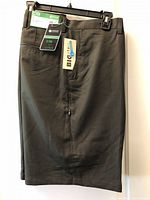 Front view of shorts showing tags, waistband, pockets