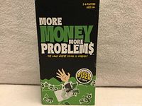Front of sealed More Money More Problems game box