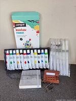 Full lot: paint box with tray of 12 tubes, 6 brush pens sealed, mini notebook