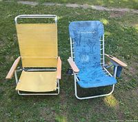 Front view of both folding chairs on grass