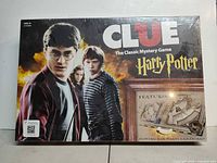 Front of sealed Clue Harry Potter board game box
