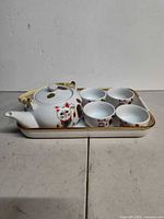 Full set: teapot, four cups, tray