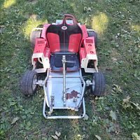 Top view of go-kart showing seat, steering column, front frame and wheels