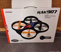 Front of boxed HakToys HAK907 quadcopter showing model and features