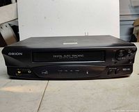Front view of Orion VR0212A VHS player showing controls and connectors