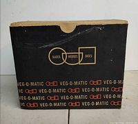 Front of Veg-O-Matic box displaying product name and cut styles