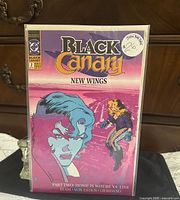 Front cover of bagged and boarded comic showing full item