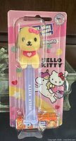 Front view of sealed Hello Kitty Puppy PEZ dispenser package