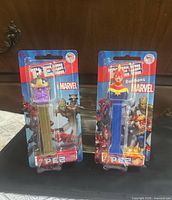 Both PEZ Marvel dispensers in blister packaging