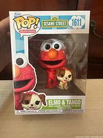 Front of sealed Funko Pop box showing figures and label #1611