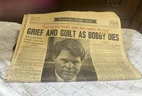 Front page showing headline and portrait of Robert F. Kennedy, stack indicates four sections