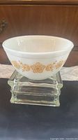 Side view showing Butterfly Gold floral pattern and overall shape