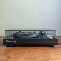 Front view of Kenwood KD-2000 turntable with dust cover closed