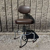 Full view of stool against wall