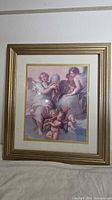 Front view showing entire framed print with angels/cherubs