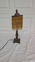 Full view of lamp with shade and cord