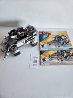 Assembled dropship with manuals and MaxSold lot tag