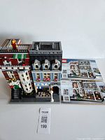 Front view of assembled Lego Pet Shop 10218 with manuals