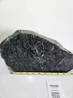 Full view of serpentine stone with measuring tape