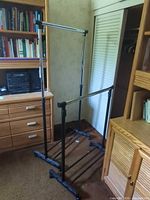 Rack fully assembled with upper and lower chrome bars extended