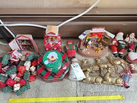 Overview of lot showing tins, gift-box ornaments, glitter reindeer, Mickey scene