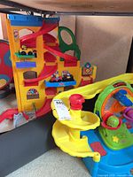 Overall view of City Skyway and spin-wheel playset with cars visible