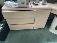 Left pedestal three-drawer section