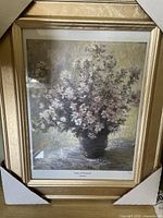 Claude Monet floral print in gold frame with corner protectors