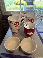 Full lot showing mugs, ramekins, egg cup