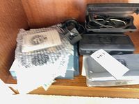 Multiple cases, adapter and packaging on shelf