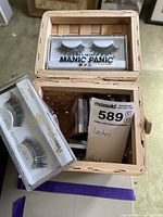 Boxed Manic Panic lashes on basket lid with Pinkee Pro lashes inside