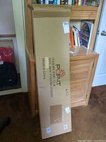 Sealed cardboard shipping box labeled POP-IT R-FSR-12
