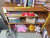 Front view of bookshelf showing shelves and contents (contents not included)