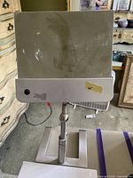 front view of magnifier lens on adjustable stand