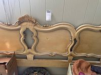 Front view of entire gilded wood headboard