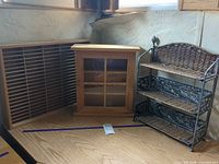 All three items grouped together: wicker shelf, wood cabinet, wood slat organizer