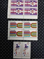 All three stamp groupings: 12¢ block, 7¢ block, 30¢ pair