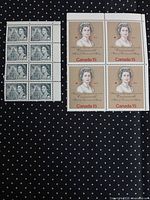 Full view of both stamp blocks, eight 8¢ and four 15¢