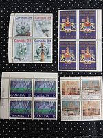 All four blocks of stamps laid out