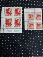 Front view of both stamp blocks showing designs and denominations
