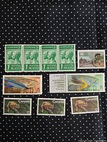 Overall view of all ten stamps arranged on dotted background