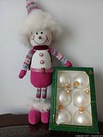 Plush snowman and ornament box full view