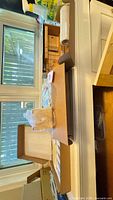 Boxed kit components on table including wax block, accessories