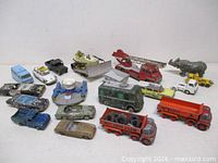 All 19 vehicles and figure laid out for overview