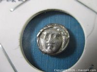 Obverse of silver diobol showing head of Apollo