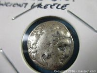 Obverse of silver drachm showing bust with lion-skin headdress