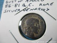 Obverse showing Apollo bust in holder