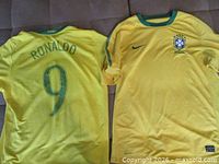 Front and back view of both yellow Brazil CBF Nike shirts, showcasing Ronaldo #9 on one and plain back on the other