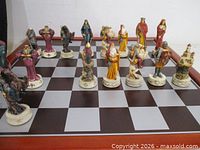 Chess pieces on board showing design and scale