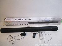 Sound bar with remote, power adapter and box